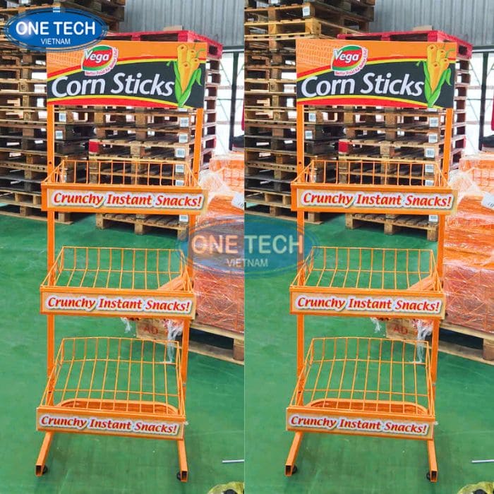 Kệ quảng cáo bim bim 3 tầng màu cam Corn Sticks